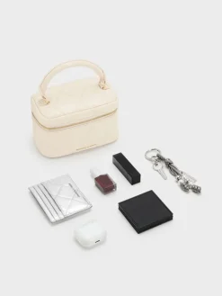 Arwen Quilted Top Handle Vanity Bag